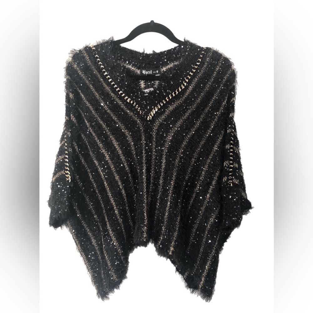 Elegant black and gold poncho … brand new small/medium.